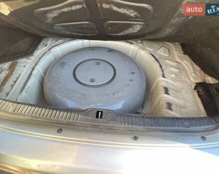 Серый Киа Черато, объемом двигателя 2 л и пробегом 233 тыс. км за 4500 $, фото 10 на Automoto.ua