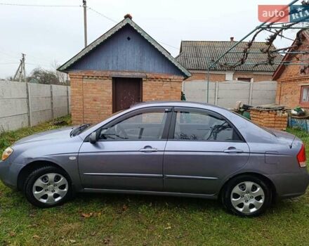 Серый Киа Черато, объемом двигателя 1.6 л и пробегом 200 тыс. км за 4100 $, фото 6 на Automoto.ua