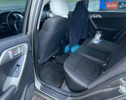 Серый Киа Черато, объемом двигателя 2 л и пробегом 177 тыс. км за 6000 $, фото 6 на Automoto.ua