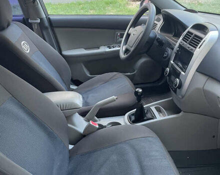 Серый Киа Черато, объемом двигателя 1.98 л и пробегом 125 тыс. км за 5999 $, фото 3 на Automoto.ua