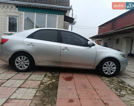 Сірий Кіа Черато, об'ємом двигуна 2 л та пробігом 235 тис. км за 6300 $, фото 7 на Automoto.ua