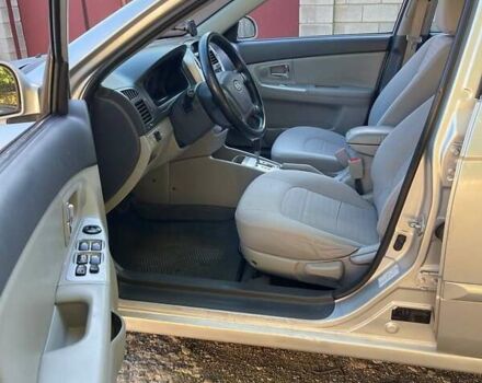 Серый Киа Черато, объемом двигателя 2 л и пробегом 233 тыс. км за 4500 $, фото 3 на Automoto.ua