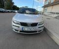 Серый Киа Черато, объемом двигателя 2 л и пробегом 274 тыс. км за 7500 $, фото 1 на Automoto.ua