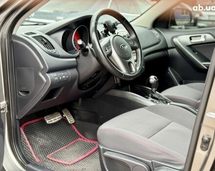 Серый Киа Черато, объемом двигателя 2 л и пробегом 170 тыс. км за 7900 $, фото 8 на Automoto.ua
