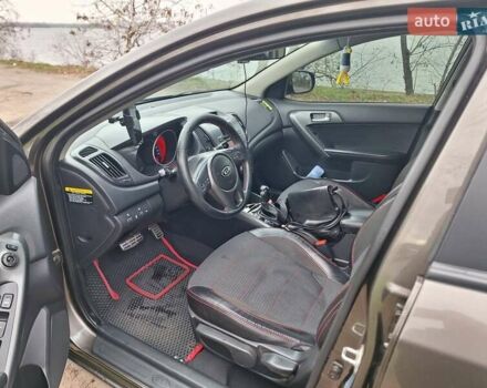 Сірий Кіа Черато, об'ємом двигуна 2 л та пробігом 165 тис. км за 7300 $, фото 7 на Automoto.ua