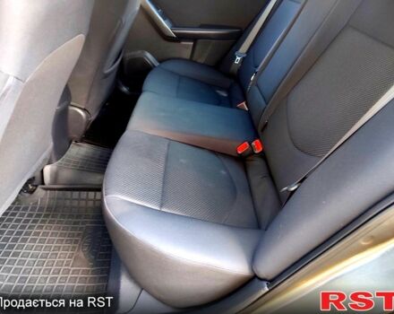 Серый Киа Черато, объемом двигателя 1.6 л и пробегом 96 тыс. км за 8200 $, фото 6 на Automoto.ua