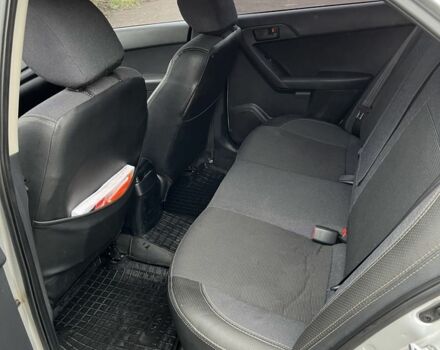 Серый Киа Черато, объемом двигателя 1.6 л и пробегом 99 тыс. км за 8400 $, фото 7 на Automoto.ua