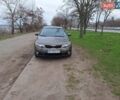 Сірий Кіа Черато, об'ємом двигуна 2 л та пробігом 165 тис. км за 7300 $, фото 4 на Automoto.ua