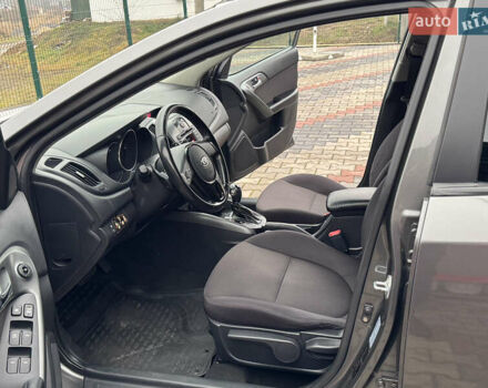 Серый Киа Черато, объемом двигателя 1.6 л и пробегом 141 тыс. км за 9800 $, фото 34 на Automoto.ua