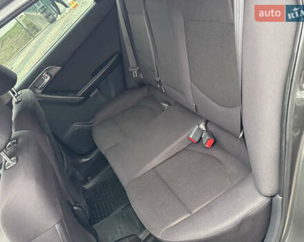 Серый Киа Черато, объемом двигателя 1.6 л и пробегом 141 тыс. км за 9800 $, фото 61 на Automoto.ua