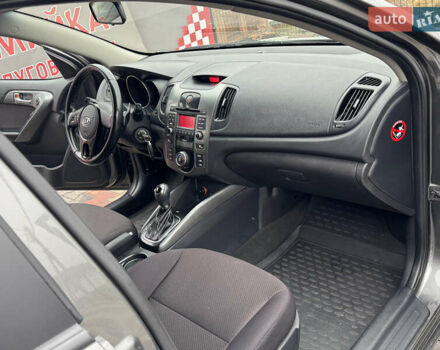 Серый Киа Черато, объемом двигателя 1.6 л и пробегом 141 тыс. км за 9800 $, фото 42 на Automoto.ua