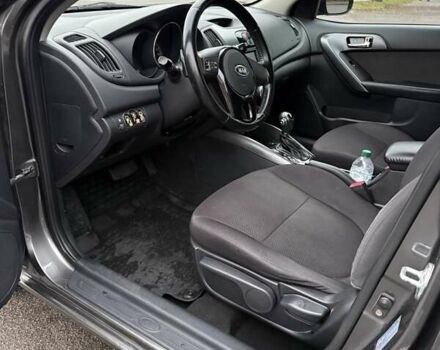 Серый Киа Черато, объемом двигателя 1.59 л и пробегом 141 тыс. км за 9600 $, фото 12 на Automoto.ua