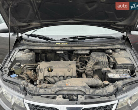 Серый Киа Черато, объемом двигателя 1.6 л и пробегом 141 тыс. км за 9800 $, фото 70 на Automoto.ua