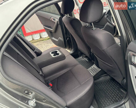 Серый Киа Черато, объемом двигателя 1.6 л и пробегом 141 тыс. км за 9800 $, фото 64 на Automoto.ua