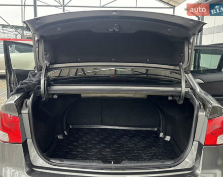 Серый Киа Черато, объемом двигателя 1.6 л и пробегом 141 тыс. км за 9800 $, фото 75 на Automoto.ua