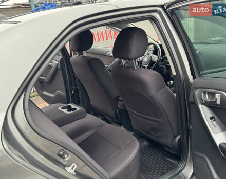 Серый Киа Черато, объемом двигателя 1.6 л и пробегом 141 тыс. км за 9800 $, фото 65 на Automoto.ua