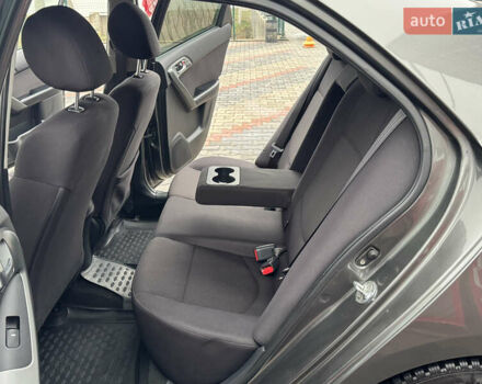 Серый Киа Черато, объемом двигателя 1.6 л и пробегом 141 тыс. км за 9800 $, фото 67 на Automoto.ua