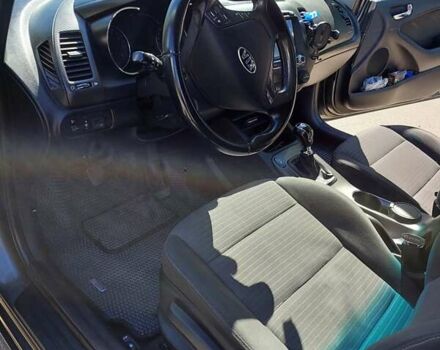 Серый Киа Черато, объемом двигателя 1.59 л и пробегом 182 тыс. км за 8000 $, фото 9 на Automoto.ua