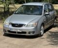 Серый Киа Черато, объемом двигателя 2 л и пробегом 200 тыс. км за 3000 $, фото 1 на Automoto.ua