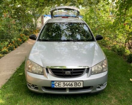 Серый Киа Черато, объемом двигателя 2 л и пробегом 268 тыс. км за 4200 $, фото 1 на Automoto.ua