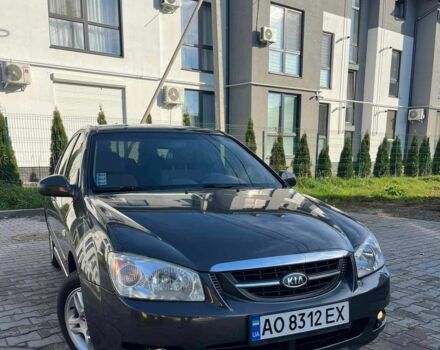 Серый Киа Черато, объемом двигателя 2 л и пробегом 280 тыс. км за 4250 $, фото 1 на Automoto.ua