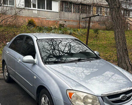 Серый Киа Черато, объемом двигателя 2 л и пробегом 214 тыс. км за 4700 $, фото 1 на Automoto.ua