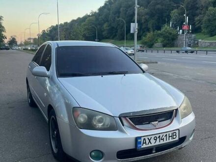Серый Киа Черато, объемом двигателя 2 л и пробегом 350 тыс. км за 4300 $, фото 1 на Automoto.ua