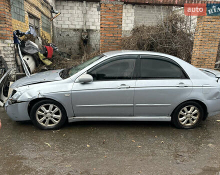 Сірий Кіа Черато, об'ємом двигуна 2 л та пробігом 280 тис. км за 2100 $, фото 1 на Automoto.ua