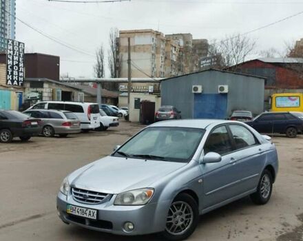 Серый Киа Черато, объемом двигателя 2 л и пробегом 230 тыс. км за 3300 $, фото 1 на Automoto.ua
