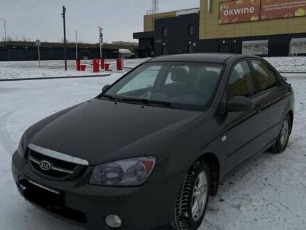 Сірий Кіа Черато, об'ємом двигуна 2 л та пробігом 316 тис. км за 4200 $, фото 1 на Automoto.ua