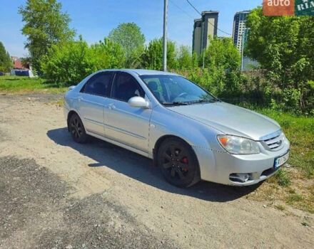 Серый Киа Черато, объемом двигателя 2 л и пробегом 306 тыс. км за 4800 $, фото 1 на Automoto.ua