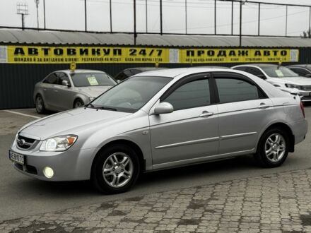 Серый Киа Черато, объемом двигателя 2 л и пробегом 240 тыс. км за 4300 $, фото 1 на Automoto.ua