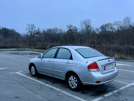 Серый Киа Черато, объемом двигателя 2 л и пробегом 326 тыс. км за 4200 $, фото 1 на Automoto.ua