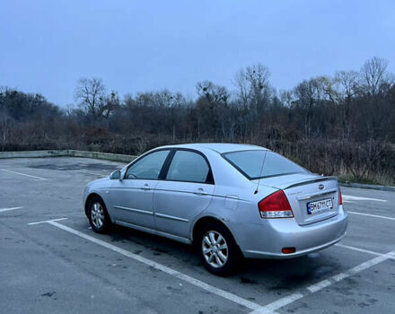 Серый Киа Черато, объемом двигателя 2 л и пробегом 326 тыс. км за 4200 $, фото 1 на Automoto.ua