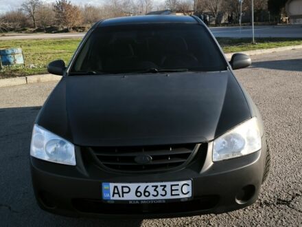 Сірий Кіа Черато, об'ємом двигуна 2 л та пробігом 310 тис. км за 4700 $, фото 1 на Automoto.ua