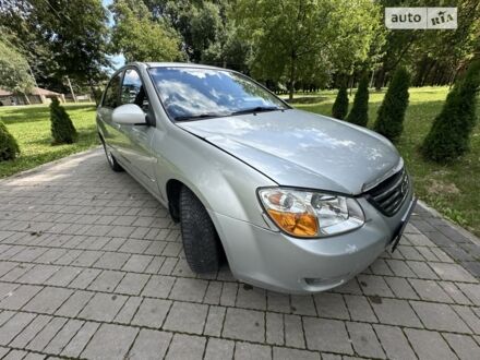 Серый Киа Черато, объемом двигателя 2 л и пробегом 257 тыс. км за 3800 $, фото 1 на Automoto.ua