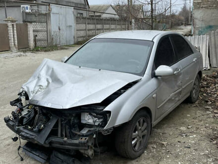 Серый Киа Черато, объемом двигателя 1.6 л и пробегом 210 тыс. км за 1900 $, фото 1 на Automoto.ua