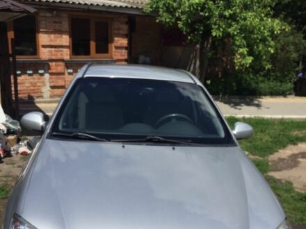 Сірий Кіа Черато, об'ємом двигуна 2 л та пробігом 138 тис. км за 6100 $, фото 1 на Automoto.ua