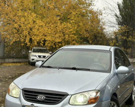 Серый Киа Черато, объемом двигателя 1.58 л и пробегом 495 тыс. км за 3900 $, фото 1 на Automoto.ua