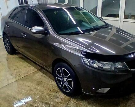 Серый Киа Черато, объемом двигателя 2 л и пробегом 250 тыс. км за 7200 $, фото 1 на Automoto.ua