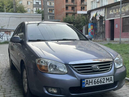 Сірий Кіа Черато, об'ємом двигуна 1.98 л та пробігом 125 тис. км за 5999 $, фото 1 на Automoto.ua