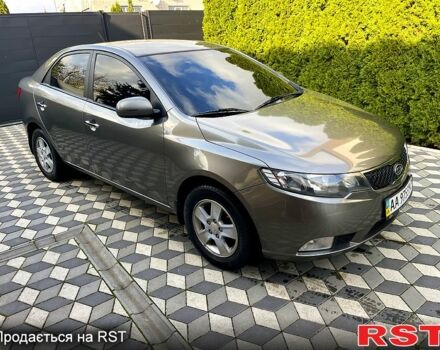 Серый Киа Черато, объемом двигателя 2 л и пробегом 190 тыс. км за 7300 $, фото 1 на Automoto.ua