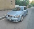 Синий Киа Черато, объемом двигателя 1.6 л и пробегом 227 тыс. км за 3400 $, фото 1 на Automoto.ua