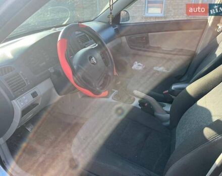 Синий Киа Черато, объемом двигателя 1.6 л и пробегом 350 тыс. км за 3000 $, фото 13 на Automoto.ua