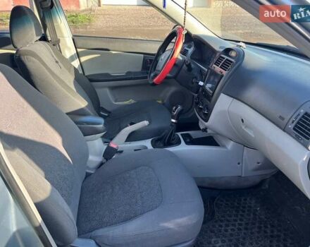 Синий Киа Черато, объемом двигателя 1.6 л и пробегом 350 тыс. км за 3000 $, фото 14 на Automoto.ua