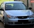 Синій Кіа Черато, об'ємом двигуна 2 л та пробігом 292 тис. км за 4950 $, фото 1 на Automoto.ua