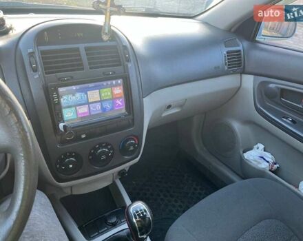 Синий Киа Черато, объемом двигателя 1.6 л и пробегом 350 тыс. км за 3000 $, фото 15 на Automoto.ua