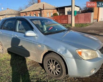 Синий Киа Черато, объемом двигателя 1.6 л и пробегом 350 тыс. км за 3000 $, фото 1 на Automoto.ua