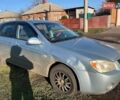 Синий Киа Черато, объемом двигателя 1.6 л и пробегом 350 тыс. км за 3000 $, фото 1 на Automoto.ua