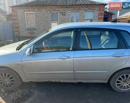 Синий Киа Черато, объемом двигателя 1.6 л и пробегом 350 тыс. км за 3000 $, фото 6 на Automoto.ua